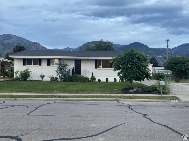 1740 N 1400 W, Provo, UT 84604 - single story home featuring brick siding, a front lawn, and a mountain view