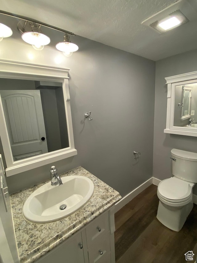 1740 N 1400 W, Provo, UT 84604 - half bath featuring wood finished floors, vanity, and a textured ceiling