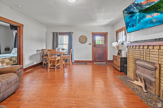 331 Chateau Thierry St, Soda Springs, ID 83276 - living area with wood finished floors and a fireplace