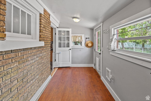 331 Chateau Thierry St, Soda Springs, ID 83276 - entryway with dark wood finished floors and brick wall