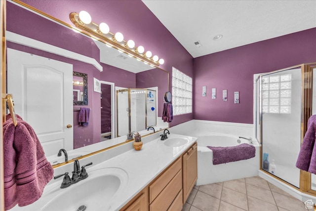 329 E 20 S, Ivins, UT 84738 - bathroom with a stall shower, a bath, tile patterned floors, and double vanity