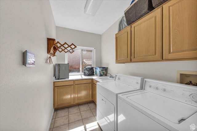 329 E 20 S, Ivins, UT 84738 - laundry room with cabinet space, washing machine and clothes dryer, and light tile patterned flooring