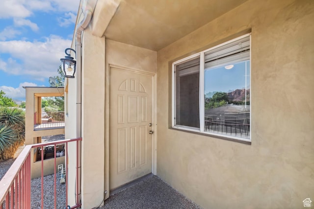 35 E 600 S Unit B202, Ivins, UT 84738 - view of exterior entry featuring stucco siding and a balcony