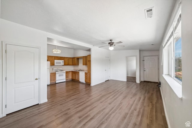 35 E 600 S Unit B202, Ivins, UT 84738 - unfurnished living room with dark wood finished floors and a ceiling fan