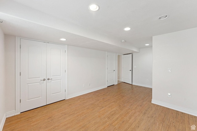 2828 W Gentile St, Layton, UT 84041 - finished below grade area with light wood-style flooring and recessed lighting