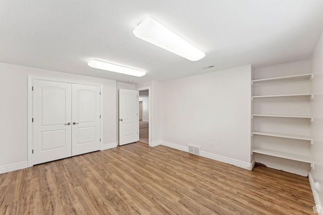 2828 W Gentile St, Layton, UT 84041 - unfurnished bedroom featuring wood finished floors and a closet