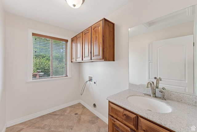 2828 W Gentile St, Layton, UT 84041 - laundry area with hookup for an electric dryer, hookup for a washing machine, and cabinet space