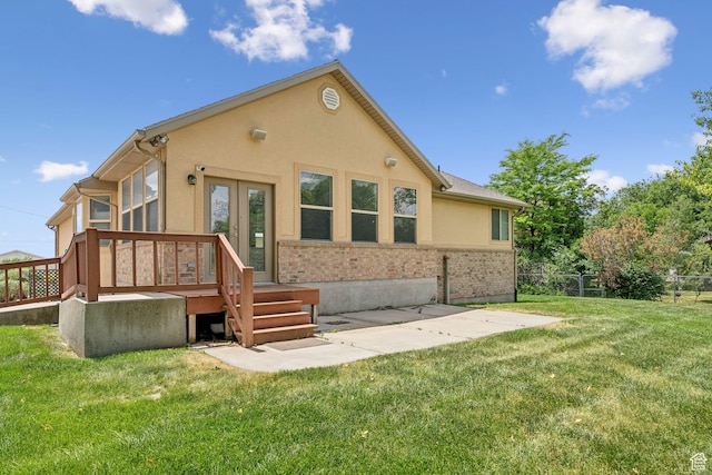 2828 W Gentile St, Layton, UT 84041 - back of property with stucco siding, a patio area, and french doors