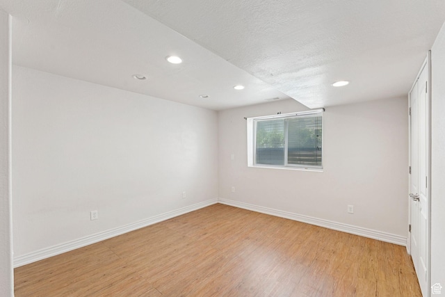 2828 W Gentile St, Layton, UT 84041 - spare room with light wood finished floors, recessed lighting, and a textured ceiling