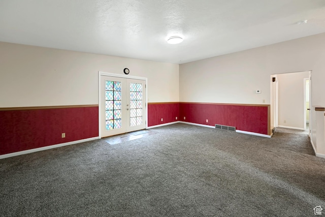421 S 90 W, Richmond, UT 84333 - carpeted spare room featuring french doors and a wainscoted wall