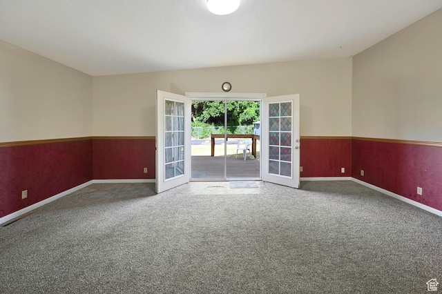 421 S 90 W, Richmond, UT 84333 - unfurnished room featuring french doors, carpet flooring, and wainscoting
