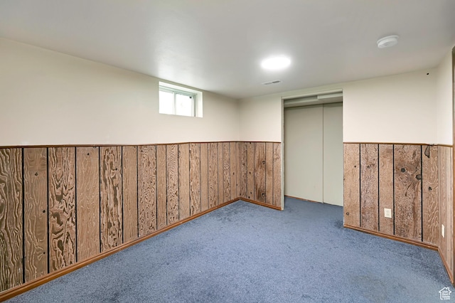 421 S 90 W, Richmond, UT 84333 - basement with carpet flooring, a wainscoted wall, and wooden walls