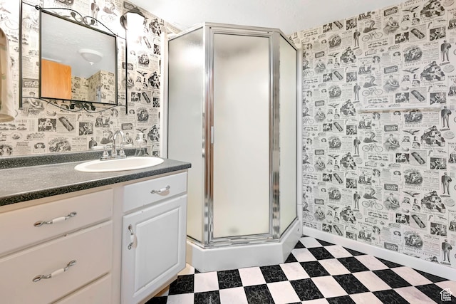 421 S 90 W, Richmond, UT 84333 - full bathroom featuring tile patterned floors, a stall shower, vanity, and wallpapered walls