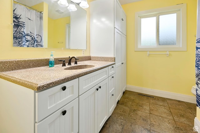 421 S 90 W, Richmond, UT 84333 - full bathroom featuring vanity and stone tile flooring