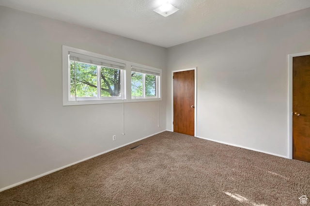 421 S 90 W, Richmond, UT 84333 - unfurnished bedroom featuring carpet flooring and baseboards