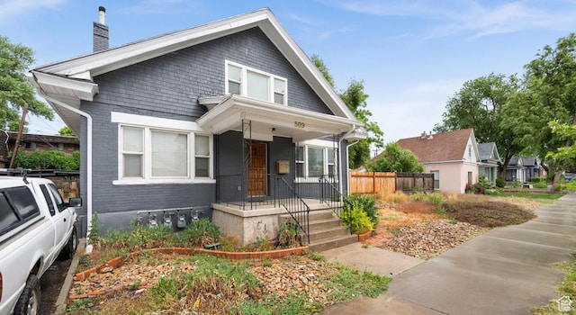 509 E 800 S, Salt Lake City, UT 84102 - bungalow-style house with covered porch and a chimney