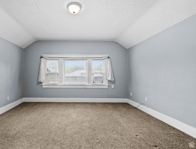 509 E 800 S, Salt Lake City, UT 84102 - bonus room featuring vaulted ceiling, carpet, and a textured ceiling