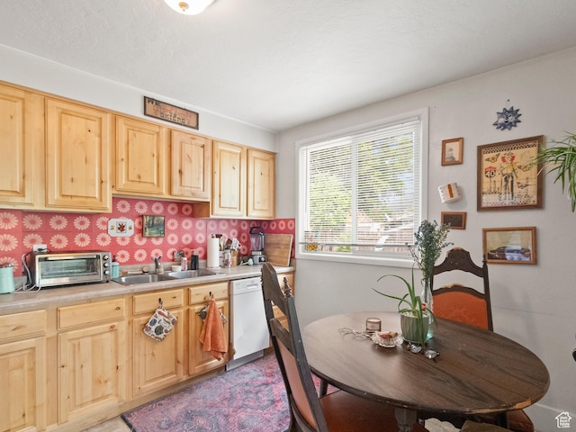 509 E 800 S, Salt Lake City, UT 84102 - kitchen featuring dishwasher, light brown cabinets, and light countertops