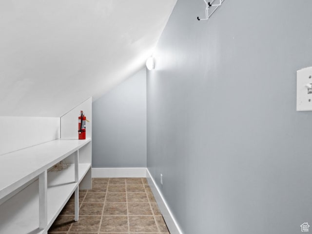 509 E 800 S, Salt Lake City, UT 84102 - additional living space featuring lofted ceiling and stone finish flooring