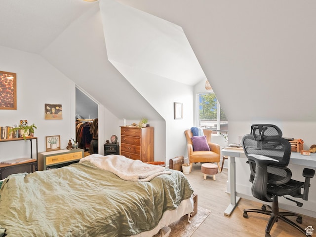 509 E 800 S, Salt Lake City, UT 84102 - bedroom featuring light wood-type flooring, vaulted ceiling, an office area, a spacious closet, and a closet