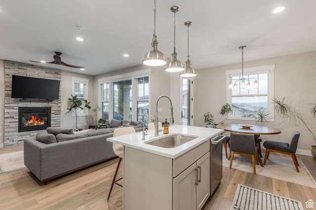 11721 N Shoreline Dr, Hideout, UT 84036 - kitchen featuring open floor plan, light wood-style flooring, a ceiling fan, light countertops, and recessed lighting