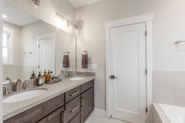 11721 N Shoreline Dr, Hideout, UT 84036 - bathroom with double vanity, a relaxing tiled tub, and tile patterned flooring