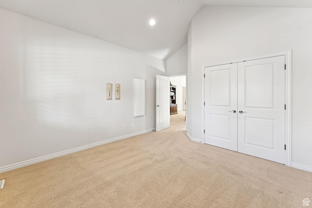 1369 E Farm Dr, Murray, UT 84117 - unfurnished bedroom featuring light carpet, high vaulted ceiling, a closet, and recessed lighting