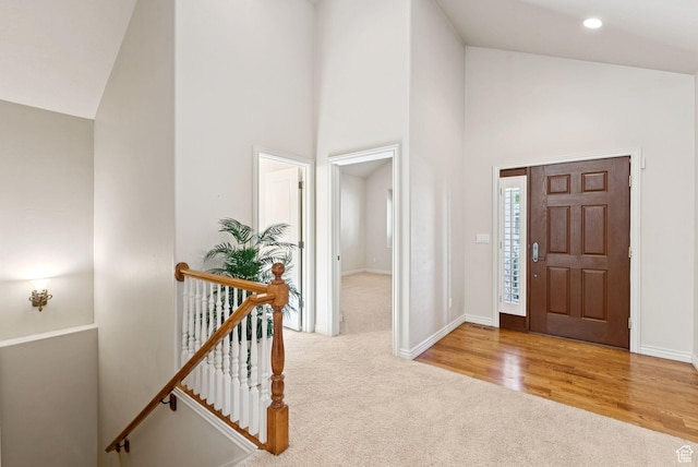 1369 E Farm Dr, Murray, UT 84117 - carpeted entryway with high vaulted ceiling and baseboards