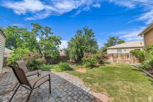 1912 E Ramona Ave, Salt Lake City, UT 84108 - fenced backyard featuring a patio area