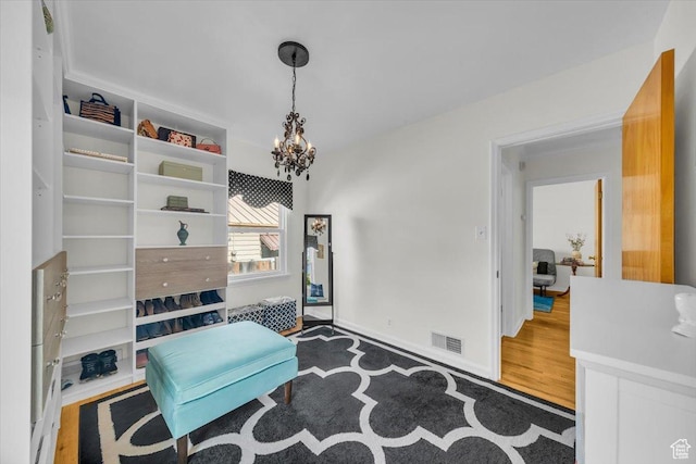 1912 E Ramona Ave, Salt Lake City, UT 84108 - living area featuring a chandelier and wood finished floors