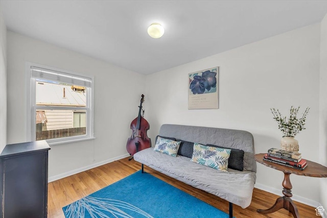 1912 E Ramona Ave, Salt Lake City, UT 84108 - sitting room featuring wood finished floors and baseboards