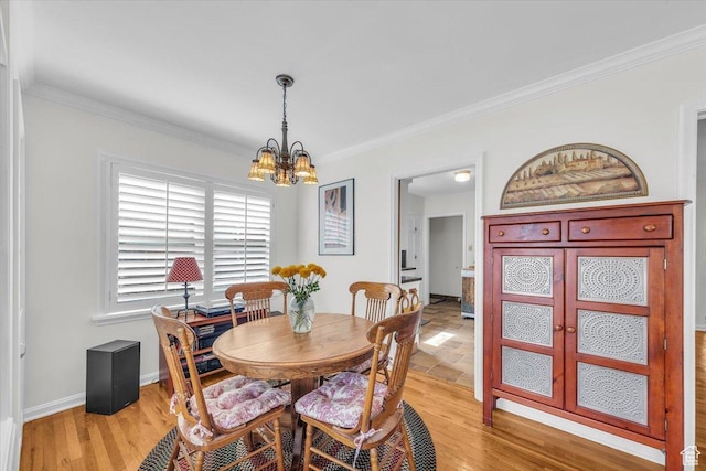 1912 E Ramona Ave, Salt Lake City, UT 84108 - dining space with a chandelier, ornamental molding, and light wood finished floors