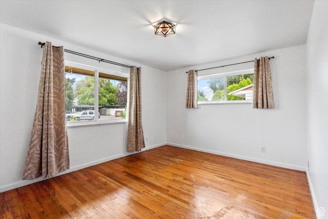 535 W Fern Dr, Midvale, UT 84047 - spare room with hardwood / wood-style floors and baseboards