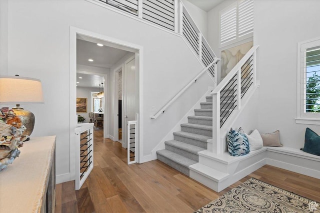 6221 W Applecross Cir, Highland, UT 84003 - stairway featuring wood finished floors and recessed lighting