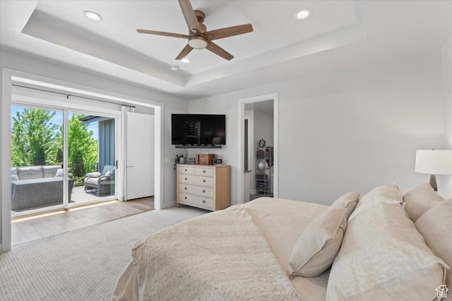 6221 W Applecross Cir, Highland, UT 84003 - bedroom featuring a tray ceiling, access to outside, recessed lighting, light colored carpet, and a ceiling fan