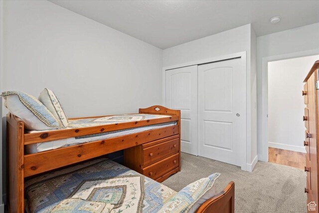 6221 W Applecross Cir, Highland, UT 84003 - bedroom featuring light carpet and a closet