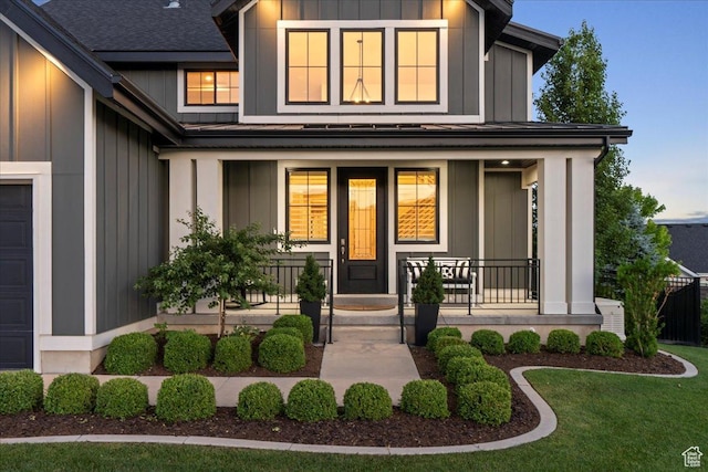 6221 W Applecross Cir, Highland, UT 84003 - property entrance featuring a porch, board and batten siding, and a shingled roof