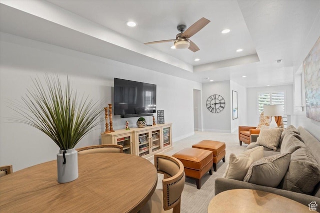 6221 W Applecross Cir, Highland, UT 84003 - living room featuring light colored carpet, recessed lighting, a ceiling fan, and a tray ceiling