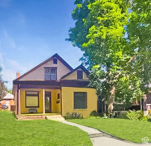 237 S 800 E, Salt Lake City, UT 84102 - view of front of home with a front yard and a porch