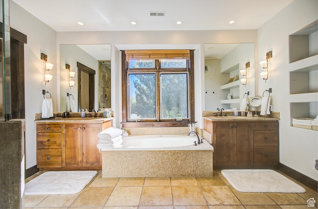 4896 Last Stand Dr, Snyderville, UT 84098 - full bathroom with a garden tub, two vanities, and recessed lighting