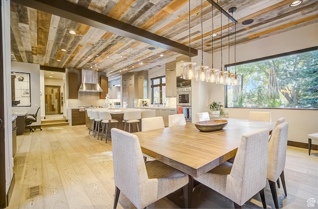 4896 Last Stand Dr, Snyderville, UT 84098 - dining space featuring light wood finished floors and recessed lighting