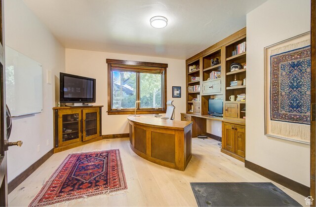 4896 Last Stand Dr, Snyderville, UT 84098 - office featuring light wood finished floors and built in study area