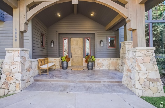 4896 Last Stand Dr, Snyderville, UT 84098 - entrance to property featuring stone siding and a porch