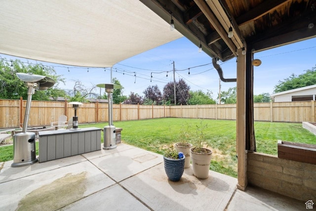1856 N Alder St, Layton, UT 84041 - fenced backyard featuring a patio area