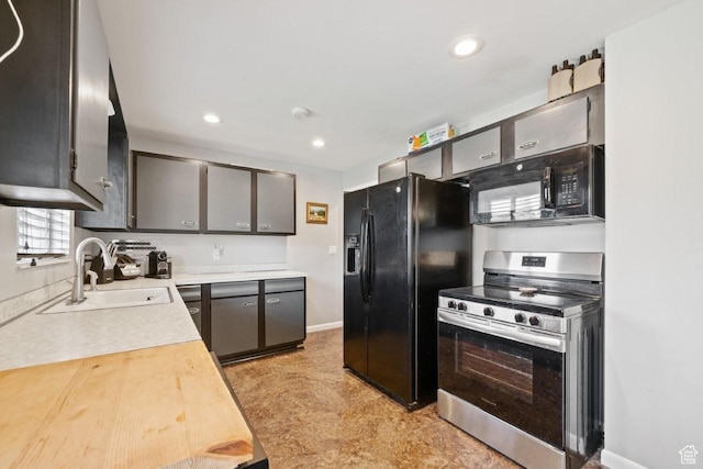 1856 N Alder St, Layton, UT 84041 - kitchen featuring black appliances, light countertops, recessed lighting, and light floors