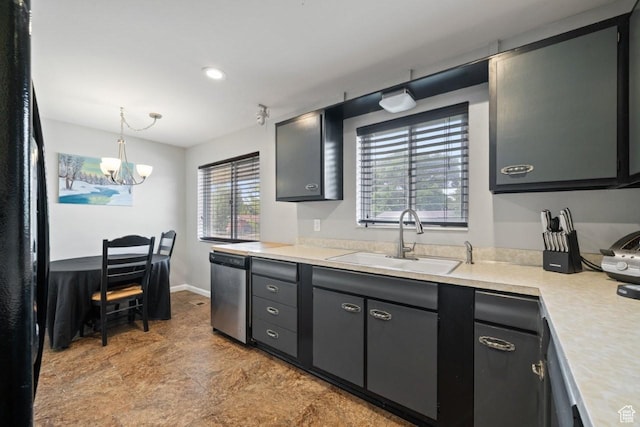 1856 N Alder St, Layton, UT 84041 - kitchen with stainless steel dishwasher, light countertops, a chandelier, pendant lighting, and black fridge