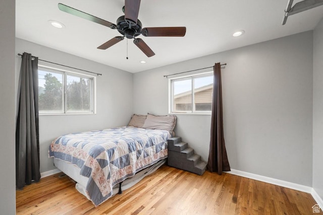 1856 N Alder St, Layton, UT 84041 - bedroom featuring multiple windows, light wood finished floors, recessed lighting, and a ceiling fan
