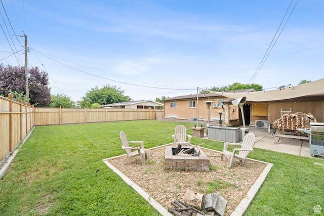 1856 N Alder St, Layton, UT 84041 - fenced backyard with a fire pit and a patio