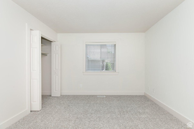 287 S 375 W, Providence, UT 84332 - unfurnished bedroom featuring light carpet and baseboards