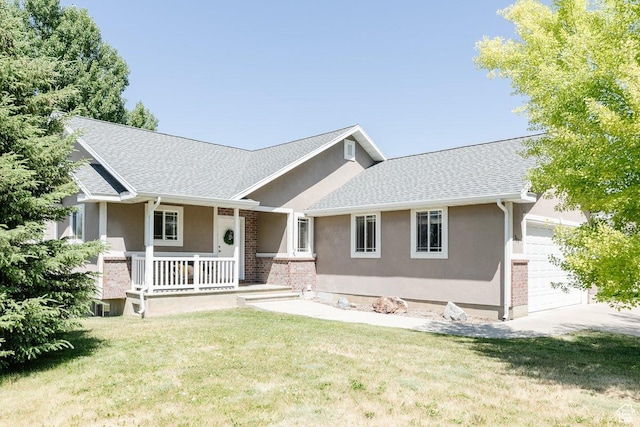 287 S 375 W, Providence, UT 84332 - ranch-style house featuring a garage, covered porch, a front yard, and stucco siding